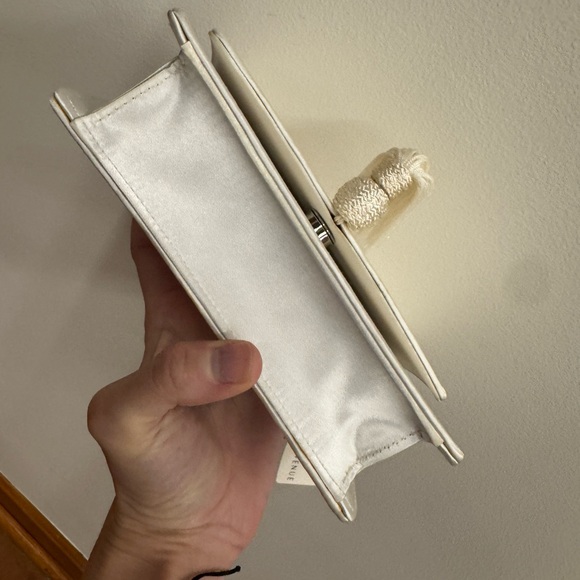 Brand new Saks Fifth Avenue satin white cross weave purse with tassel and tags - Picture 5 of 6